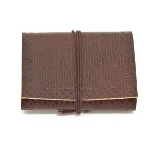 Cuaderno o cancionero de cuero marrón oscuro con...